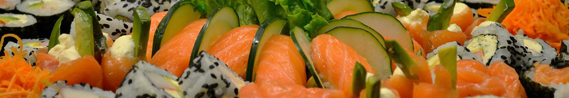 Eating Japanese Sushi at California Monster Sushi restaurant in Kent, WA.
